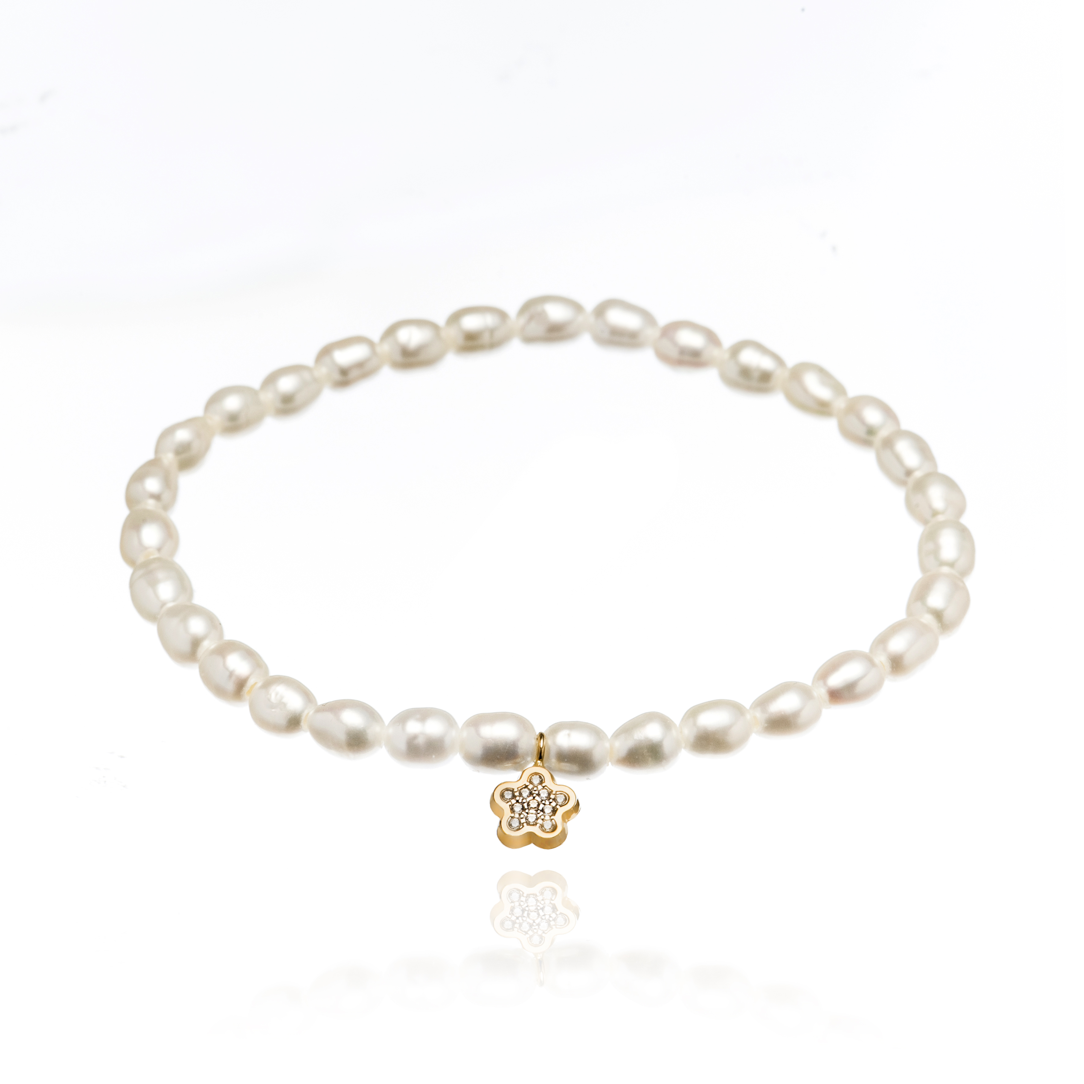 PULSERA 18K PERLAS MOTIVO FLOR CIRCON