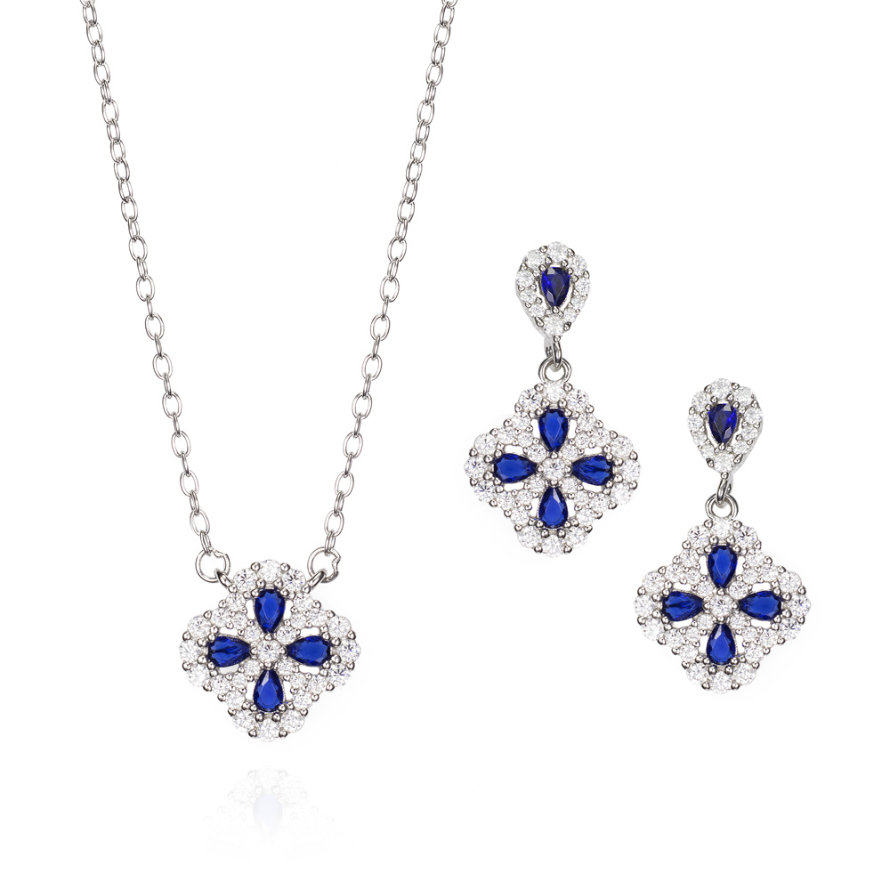 Juego de plata trébol con piedra azul