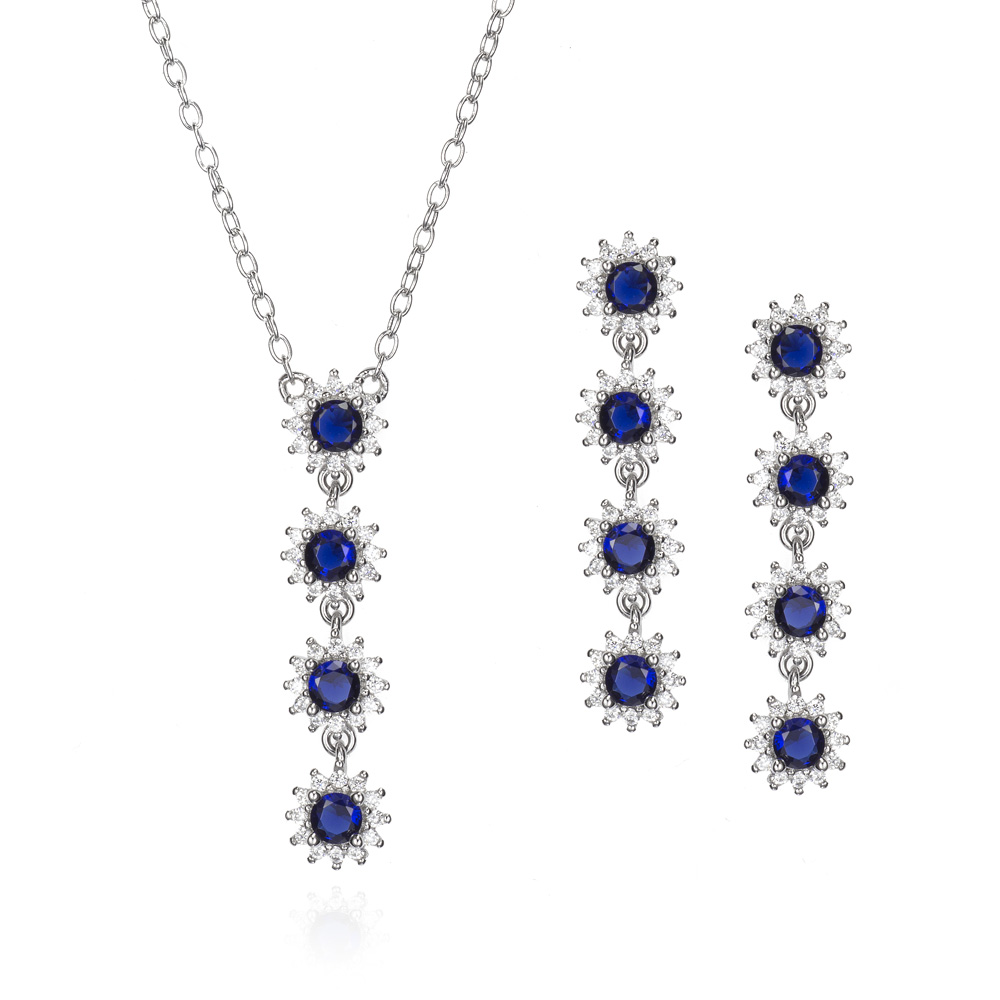 Juego de plata orlas colgando con piedra azul