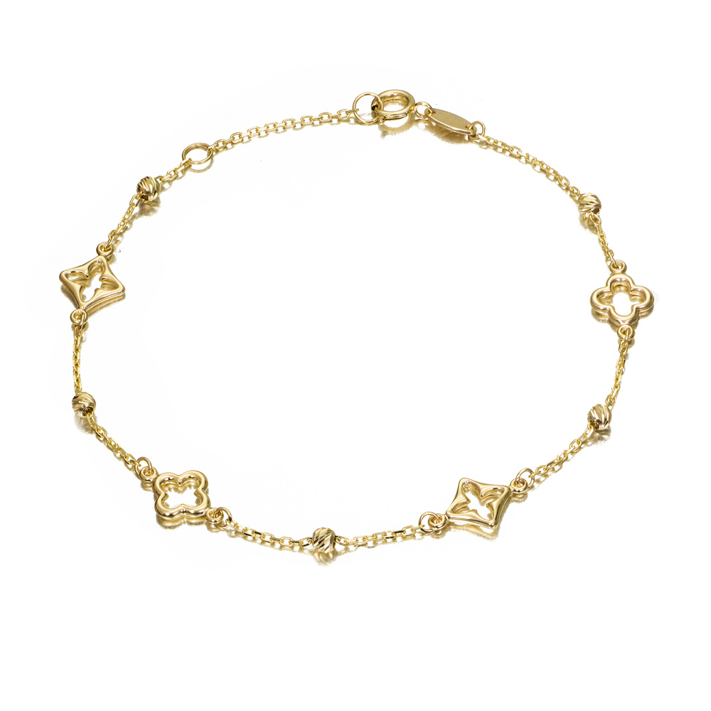 Pulsera de oro 9K con bolitas, flores y estrellas